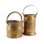 A continental embossed copper coal bucket, with loop handle, 50cm high, and a brass coal bucket. (