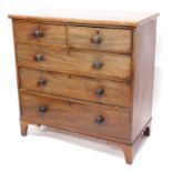 A Victorian mahogany chest of two short and three long drawers, with turned wood handles, on bracket