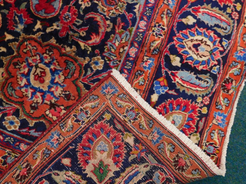 A large Persian Meshed type carpet, with a central medallion, surrounded by an elaborate design to - Image 3 of 3