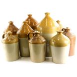 A collection of Lincoln stoneware flagons, names to include Thornton, William Cass, Robert Drury,