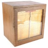 A collectors cabinet, containing a large quantity of microscope slides, to include algae,