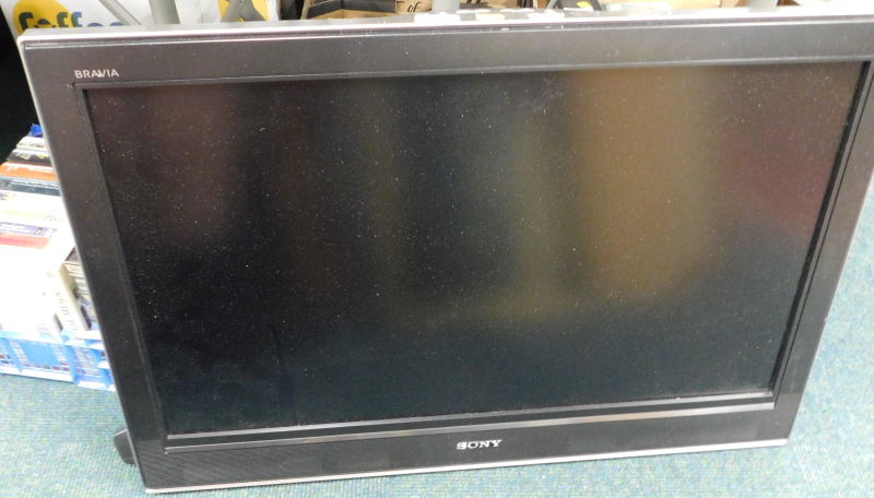 A Sony 31" television, with wall bracket, lead and remote.