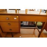 A teak Symbol dressing table, 72cm high, 107cm wide, 42cm deep.