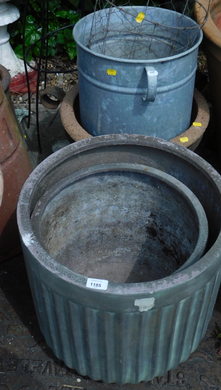 A quantity of large plant pots, and a metal ornamental garden statue.