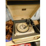 A Dansette Bermuda record player.