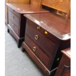 A pair of Stag Minstrel bedside cabinets.