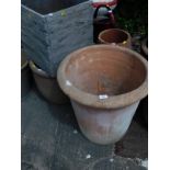 A quantity of plant pots and planters, to include a large terracotta example.