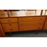 A Symbol Furniture teak chest of drawers, with three long and three short drawers, 72cm high,