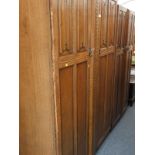 Two BC and S London Furniture oak double wardrobes.