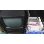 A GBI television with integrated video, in canvas travelling case, with various equestrian VHS Vide