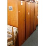 A pair of Symbol Furniture teak wardrobes.