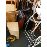 A collection of furniture, to include two pine carver chairs, a wicker linen basket, mobility aides,