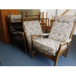 A set of three armchairs, in floral upholstery. The upholstery in this lot does not comply with