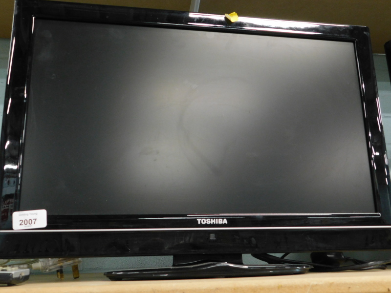 A Toshiba 22" flat screen television, with lead and remote.