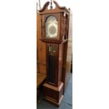 An Emperor grandmother clock, with brass face and Arabic numerals, with weights and pendulum.