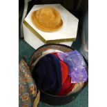 A quantity of ladies hats, to include a Christian Dior Diorling red felt hat, two Kangol hats,