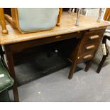 An oak office desk, with three drawers, the top 120cm x 68cm.