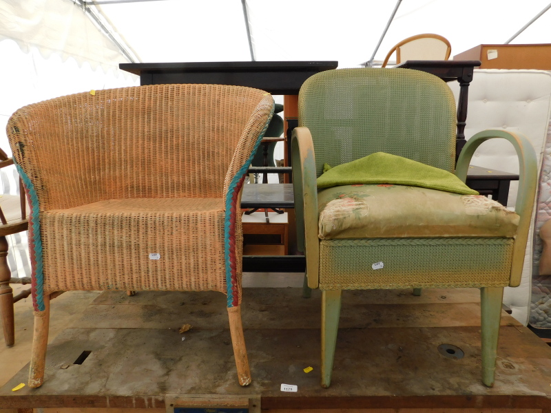 Two Lloyd loom style chairs.