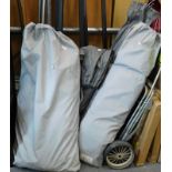 Various caravan awnings, and a folding trolley, possibly for golf, etc., (a quantity).