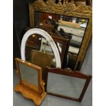 A collection of mirrors, to include a light mahogany toilet mirror, a walnut mirror from a
