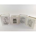 Four Heritage Village Collection porcelain houses, Dickens' Village Series, comprising Fezziwigg's