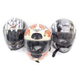 A Shoei XR1000 motorcycle helmet, AVG type A motorcycle helmet and a Red Zed RX-406 motorcycle