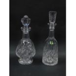 A Waterford crystal decanter and stopper decorated in the Lismore pattern, of mallet form, 34cm high