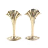 A pair of Art Nouveau silver plated posie vases, of fluted trumpet form, 18cm high.