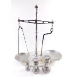 A vintage set of Co-operative Wholesale Society shop scales, with weights for 2lbs, 4lbs and 7lbs, r