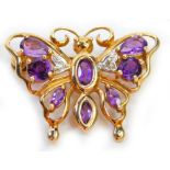 A 9ct gold butterfly brooch, set with two tiny diamonds and various amethysts, 2.5cm wide, 2.9g all