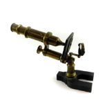 A Hartnack and Prazmowski 19thC brass and cast iron microscope, for Bezu, Harsser and Cie, Paris., t