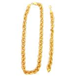 A multi link necklace and bracelet set, each with large outer link, with interlinked four joint and