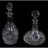 A heavy cut glass decanter, and stopper, 32.5cm high, together with a cut glass ships decanter and s