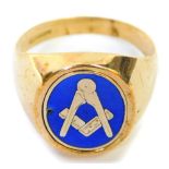 A 9ct gold Masonic gentleman's signet ring, the oval panel set with blue enamelling and Masonic symb