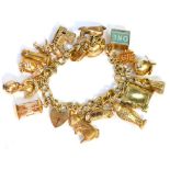 A 9ct gold charm bracelet, with various charms, some hallmarked and stamped 9ct and some unmarked, h