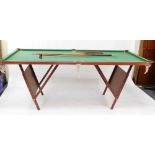 A folding snooker and billiards table and accessories, 215cm x 100cm.