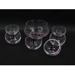 A clear and pink striped cut glass fruit set, comprising one large and five small bowls, together wi