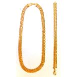 A 9ct gold necklace and bracelet set, the necklace of multi link articulated form, with clip clasp,