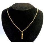 A 9ct gold pendant and chain, the pendant of rectangular design, with various twist panels, floral e