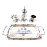 An Egyptian four piece condiment set, white metal and niello decorated with Nile scenes, monogram en