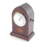 An Edwardian lancet mahogany inlaid mantel clock, circle enamelled dial bearing Roman and Arabic num