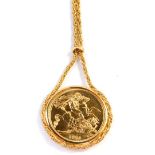 An Elizabeth II full gold sovereign pendant and chain, dated 1981, the pendant surround is the appli