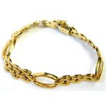 A 9ct gold fancy link bracelet, with pebble type three layer design, and three hoop detailing, 20cm