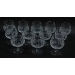 A set of twelve Waterford crystal brandy balloons decorated in the Colleen pattern.