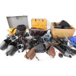 Canon and other cameras, some digital, together with lenses and accessories, two cases. (a quantity)