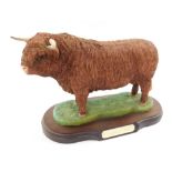 A Naturecraft figure modelled as a Highland Bull, Best of Breed, limited edition 504/2000, on an ova