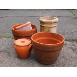 A stoneware chimney pot, of shaped octagonal form, 50cm high, 32cm wide, 32cm deep, various fire cla