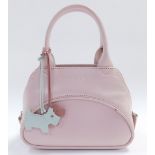 A Radley tote bag, in baby pink, with two attached Radley dogs, Radley cleaning kit and cloth, with