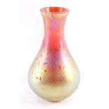 A red and gold iridescent glass vase, probably Royal Brielley, 23cm high.