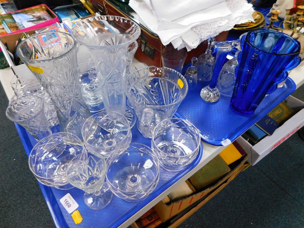 Various moulded glassware, sundae dishes, blue glass vase, etched drinking glasses, etc. (2 trays)